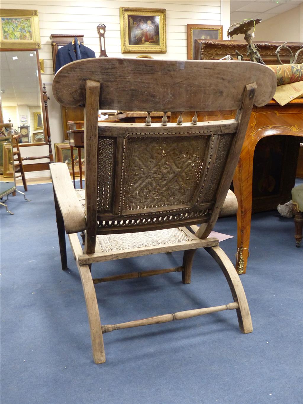 An Anglo Indian caned bleached hardwood steamer chair